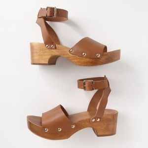Lulu’s leather open-toe wood clogs